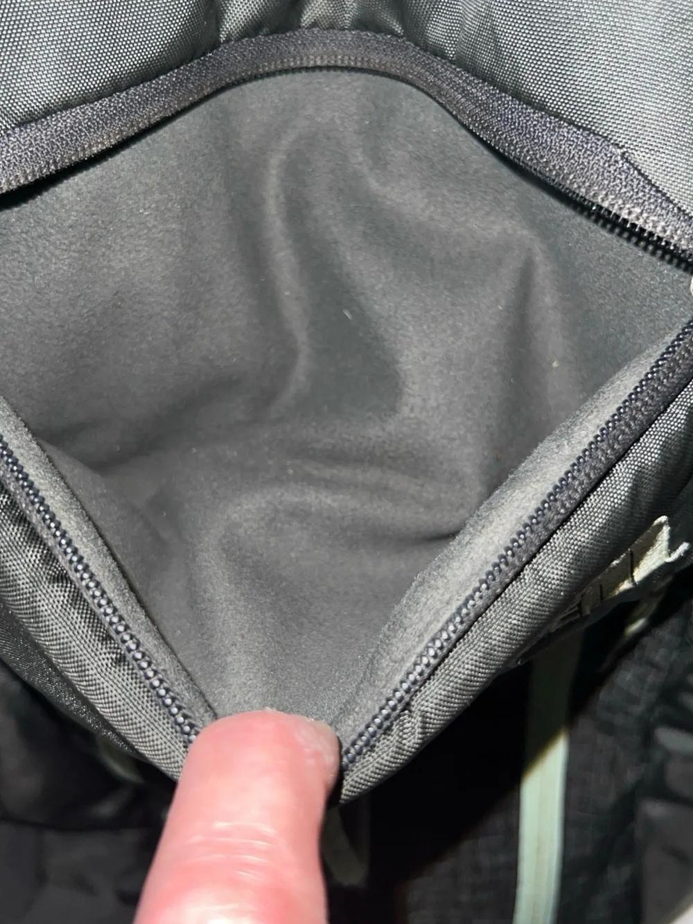 The North Face Black Backpack with Light Gray-Green Accents